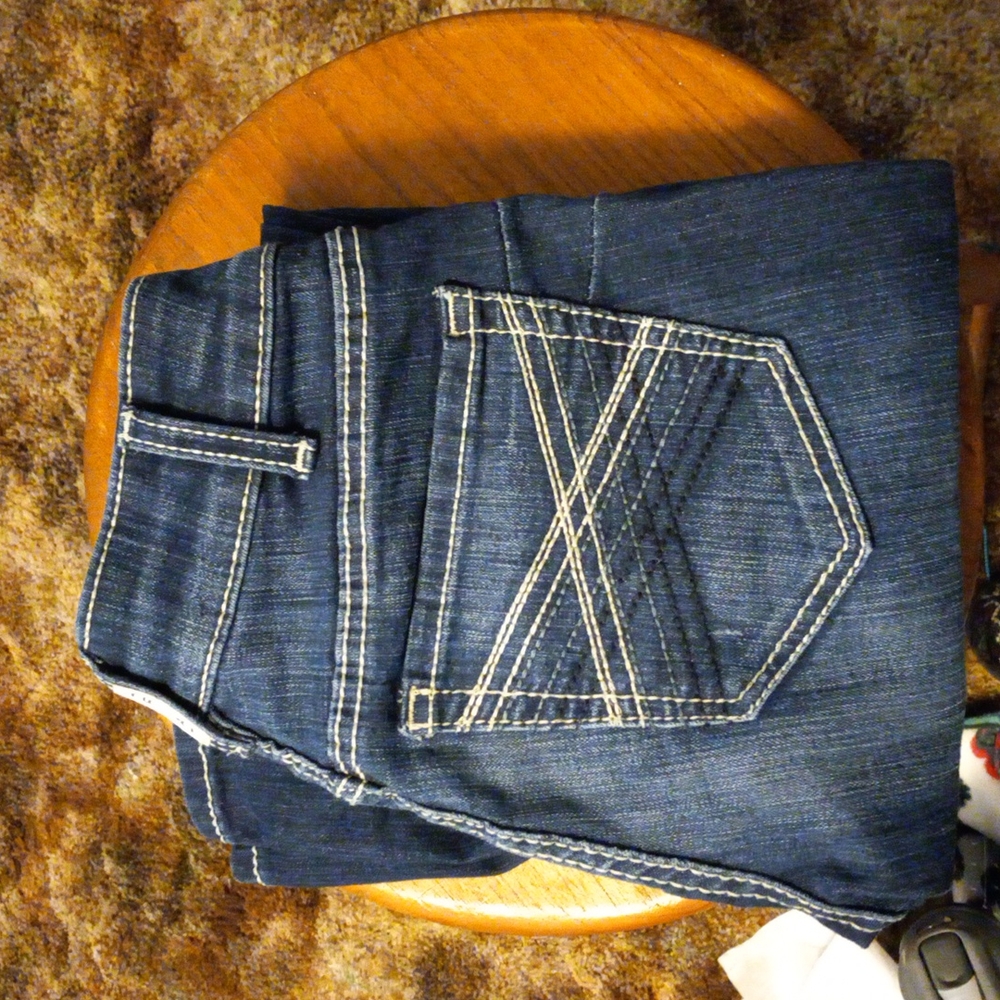 Ariat R.E.A.L denim mid rise straight leg jeans. Size is 26 regular Never worn